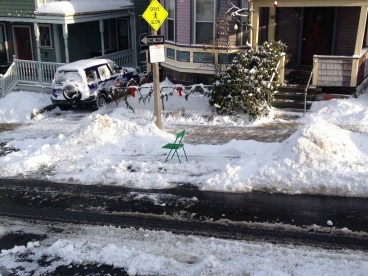 What a lovely green chair...in the middle...of the street.  Now my neighbor who saw me take this picture is probably thinking that I called the City on them.